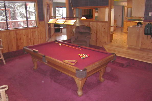 Entertain your guests with hot tub, pool table, large redwood decks, views of Heavenly Ski Area and several mountain ranges, wood stove, cable TV, jacuzzi whirlpool jet tub, spa, hickory wood flooring, wood paneling and fun open floor plan.