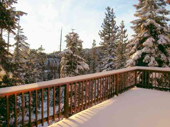 Overlook several snow-capped mountain ranges and Heavenly
              Ski Area from 1000 square feet of private deck and many windows.